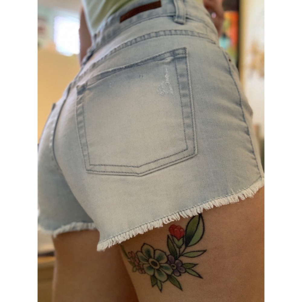 Size 26, Billabong high waisted indigo jean shorts